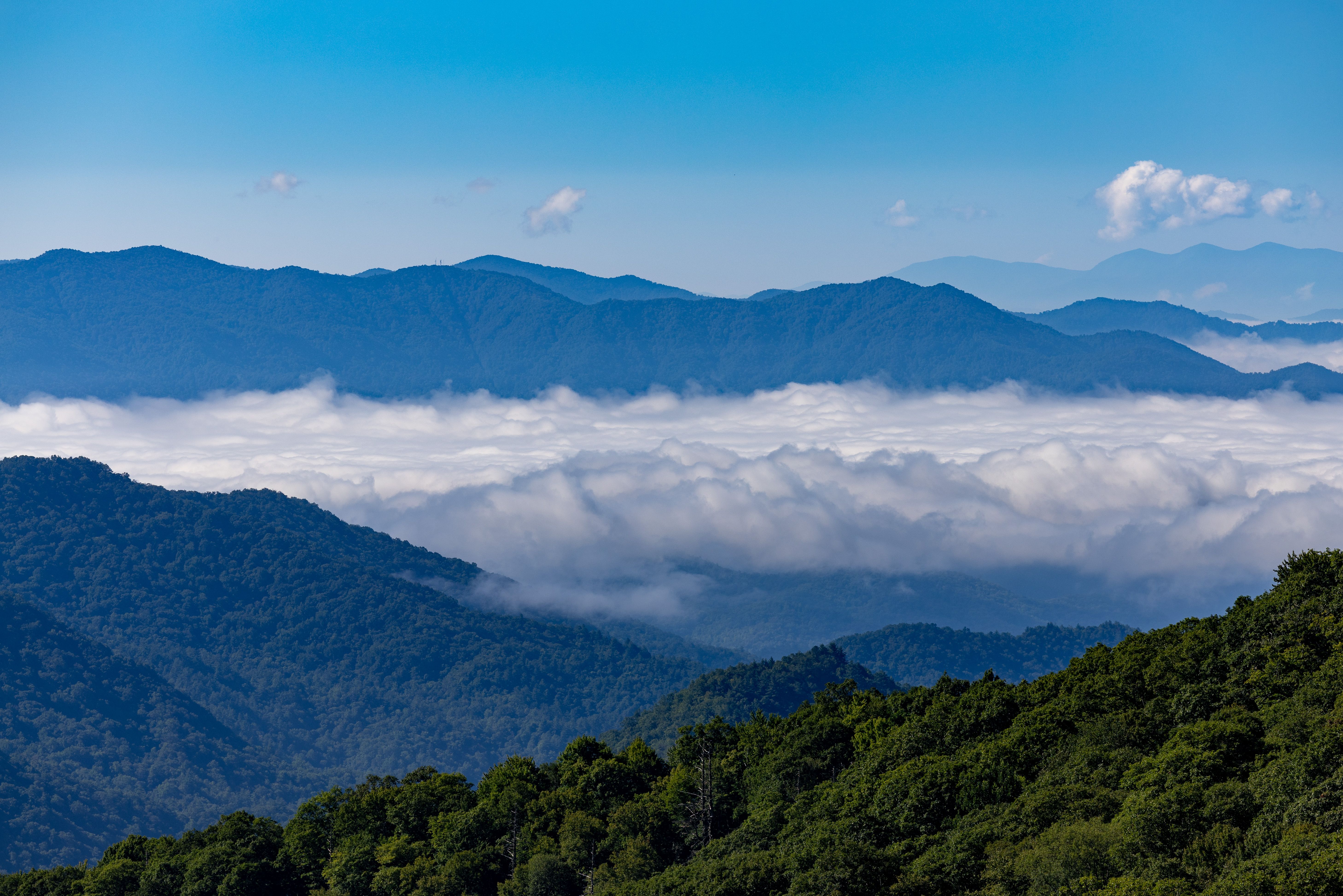 Breathtaking Mountain Landscape with Rolling Clouds · Free Stock Photo