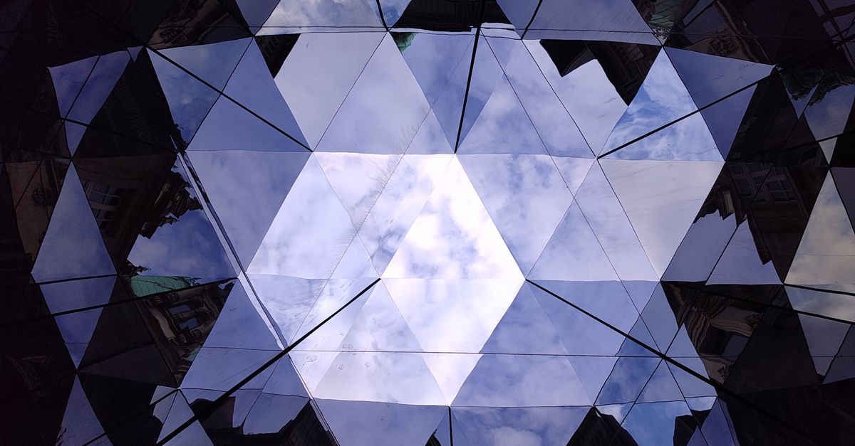Geometric Sky Reflection in Kaleidoscope Effect · Free Stock Photo