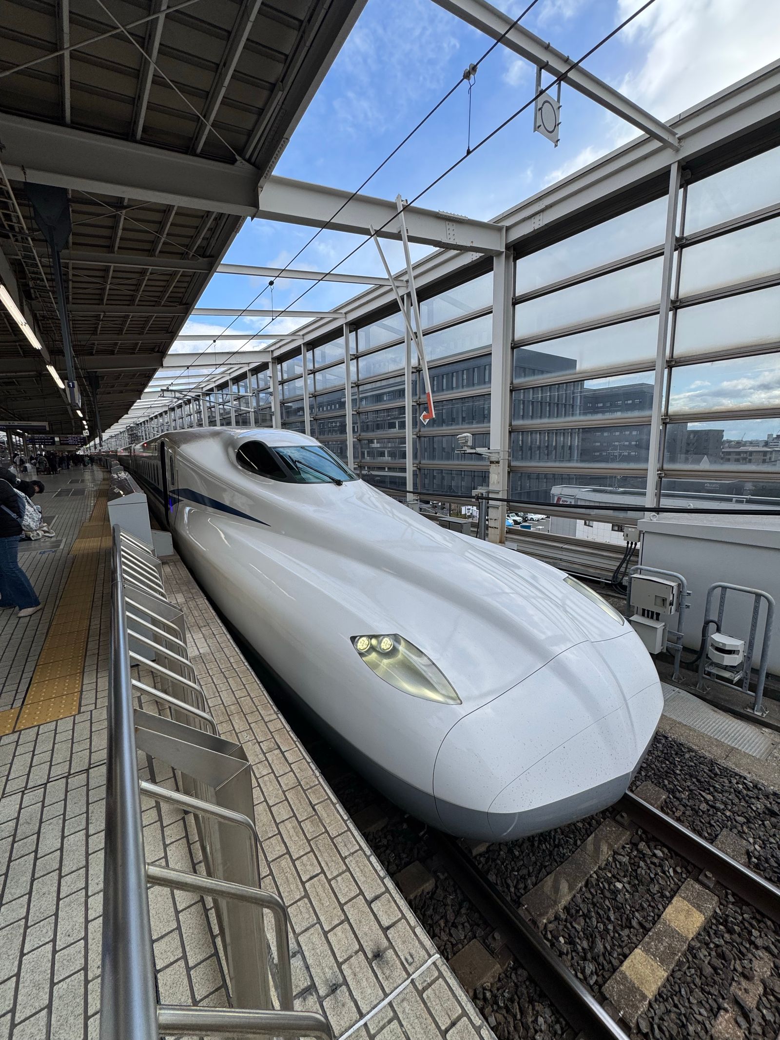 Modern Shinkansen bullet train at a station in Japan