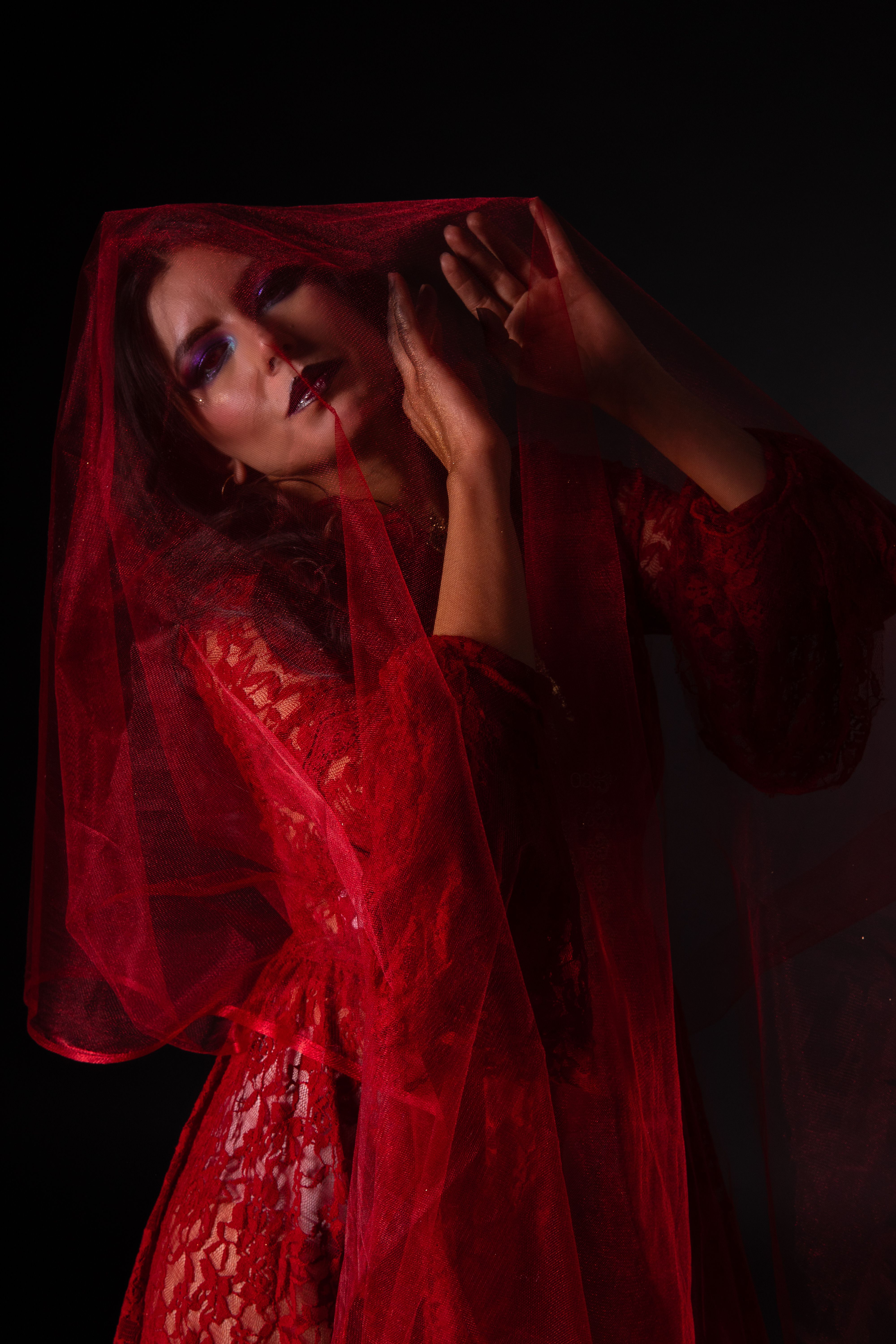 Enchanting Portrait of a Woman in Red Tulle Dress · Free Stock Photo