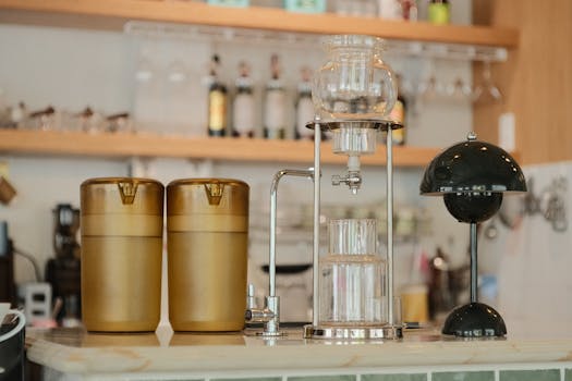 Stylish coffee shop interior showcasing modern brewing equipment and decor for a cozy ambiance.