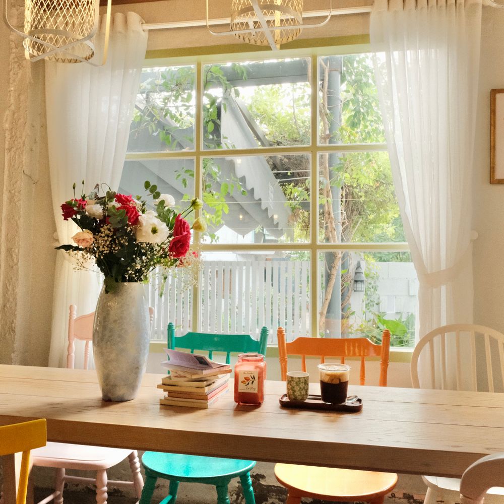Wallpapering in Parsons Green — woodwork brushed to a crisp, smooth line