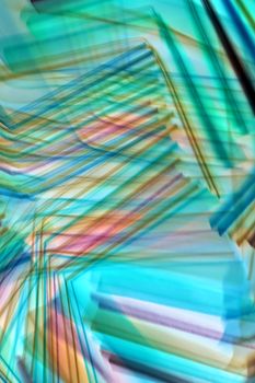 Colorful and dynamic abstract light trails in artistic motion blur effect.
