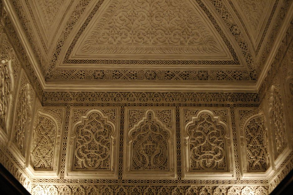Detailed view of Islamic architectural motifs and patterns inside a historic building.