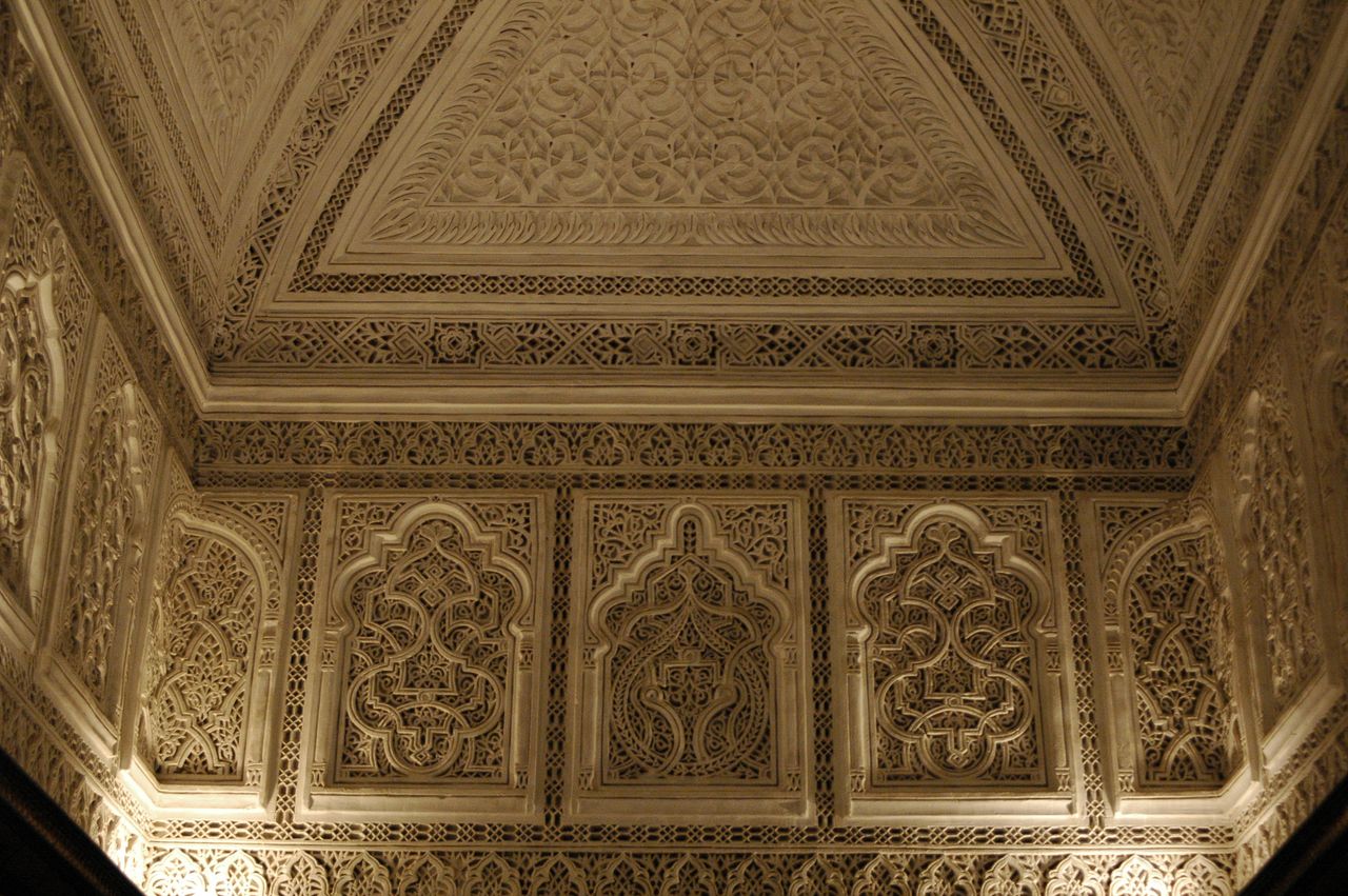 detailed view of islamic architectural motifs and patterns inside a hi