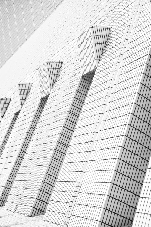 Free Monochromatic abstract architectural shot highlighting geometric patterns in Kowloon, Hong Kong. Stock Photo
