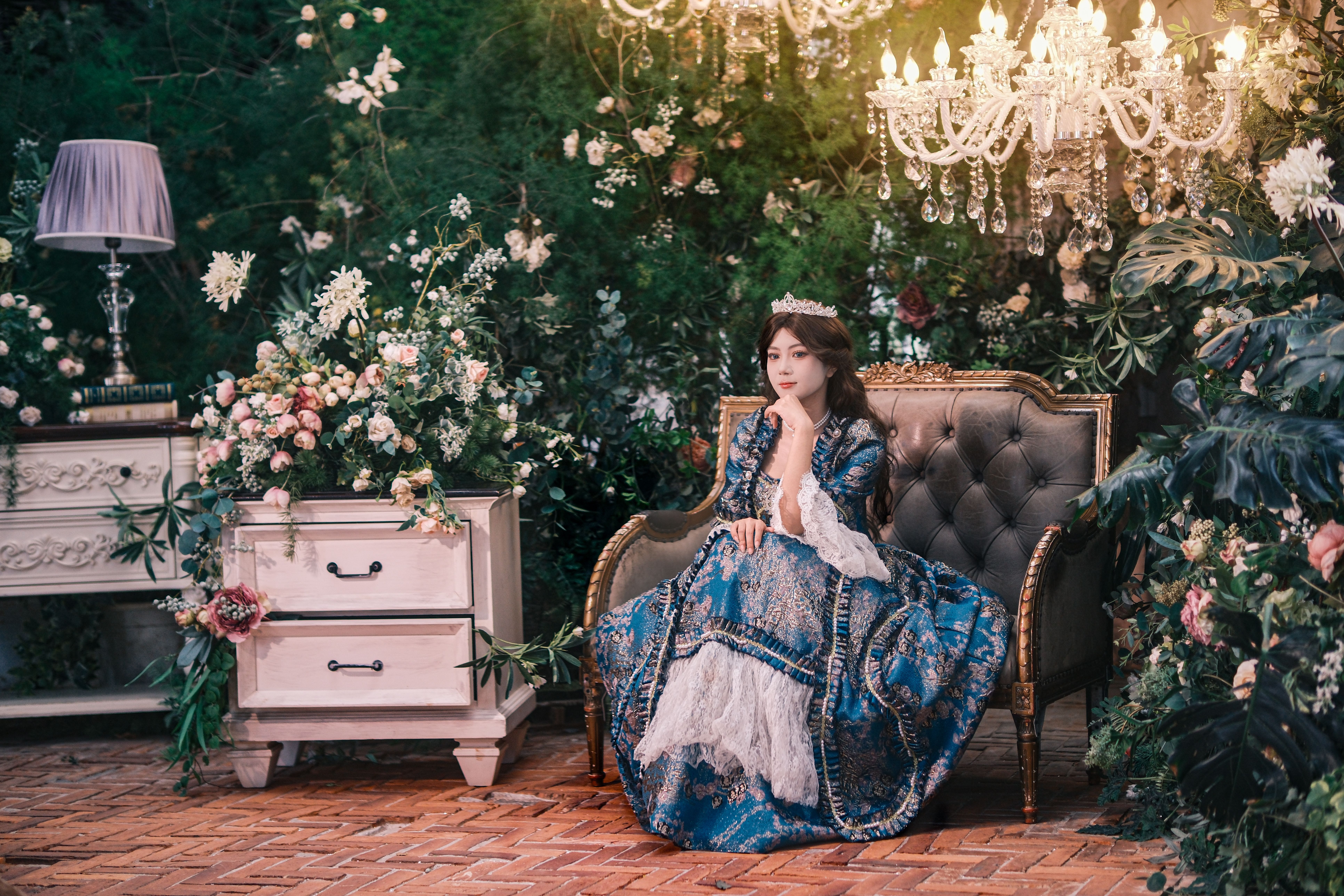 Elegant Lady in Vintage Floral Setting Indoors · Free Stock Photo