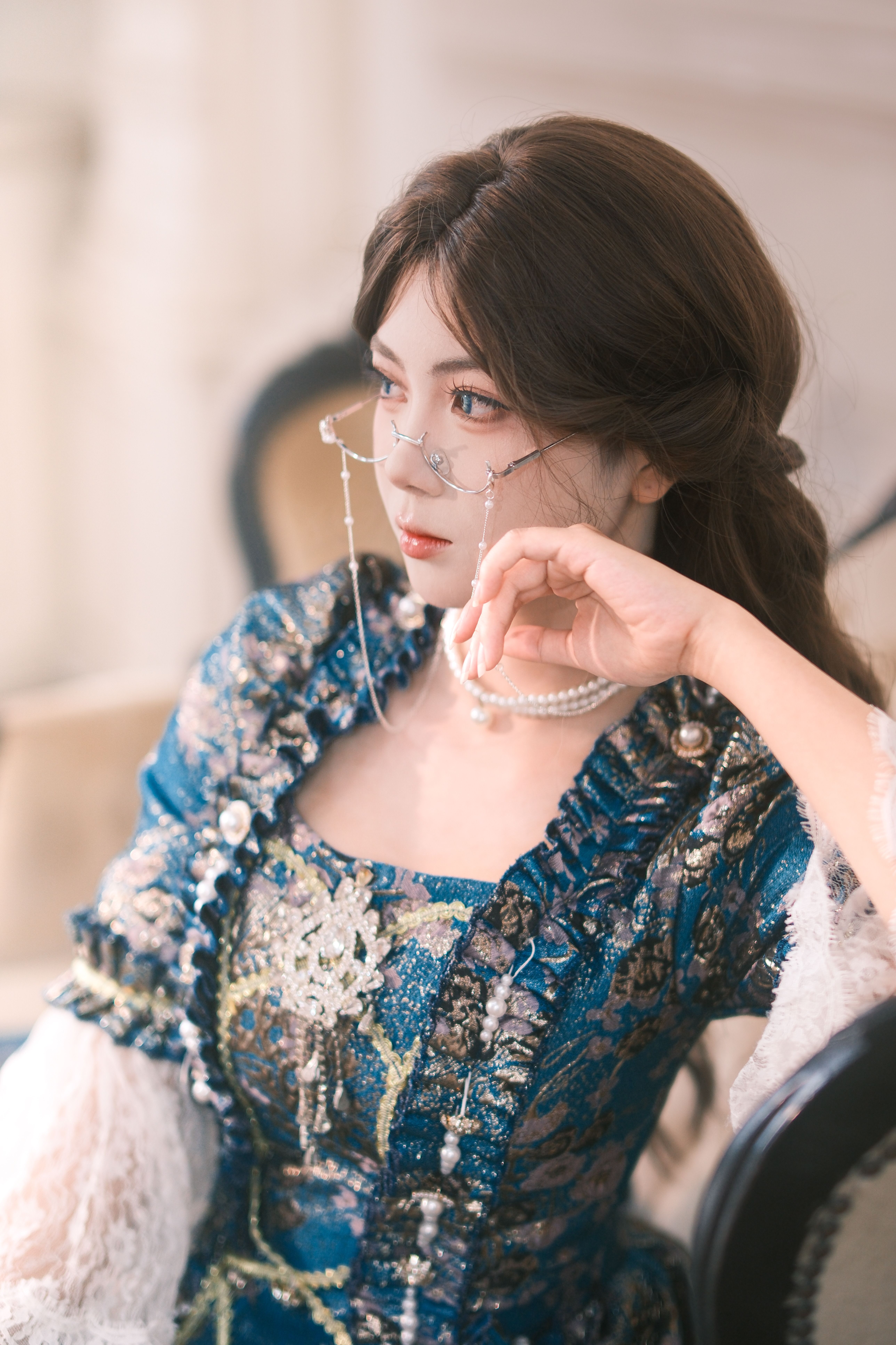 Elegant Woman in Vintage Blue Dress Indoors · Free Stock Photo