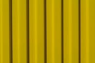 Vibrant Yellow Corrugated Metal Wall Background