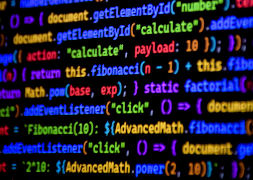 Colorful JavaScript Code on Monitor Screen · Free Stock Photo