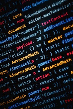 Close-up of vibrant JavaScript code displayed on a monitor showcasing web development.
