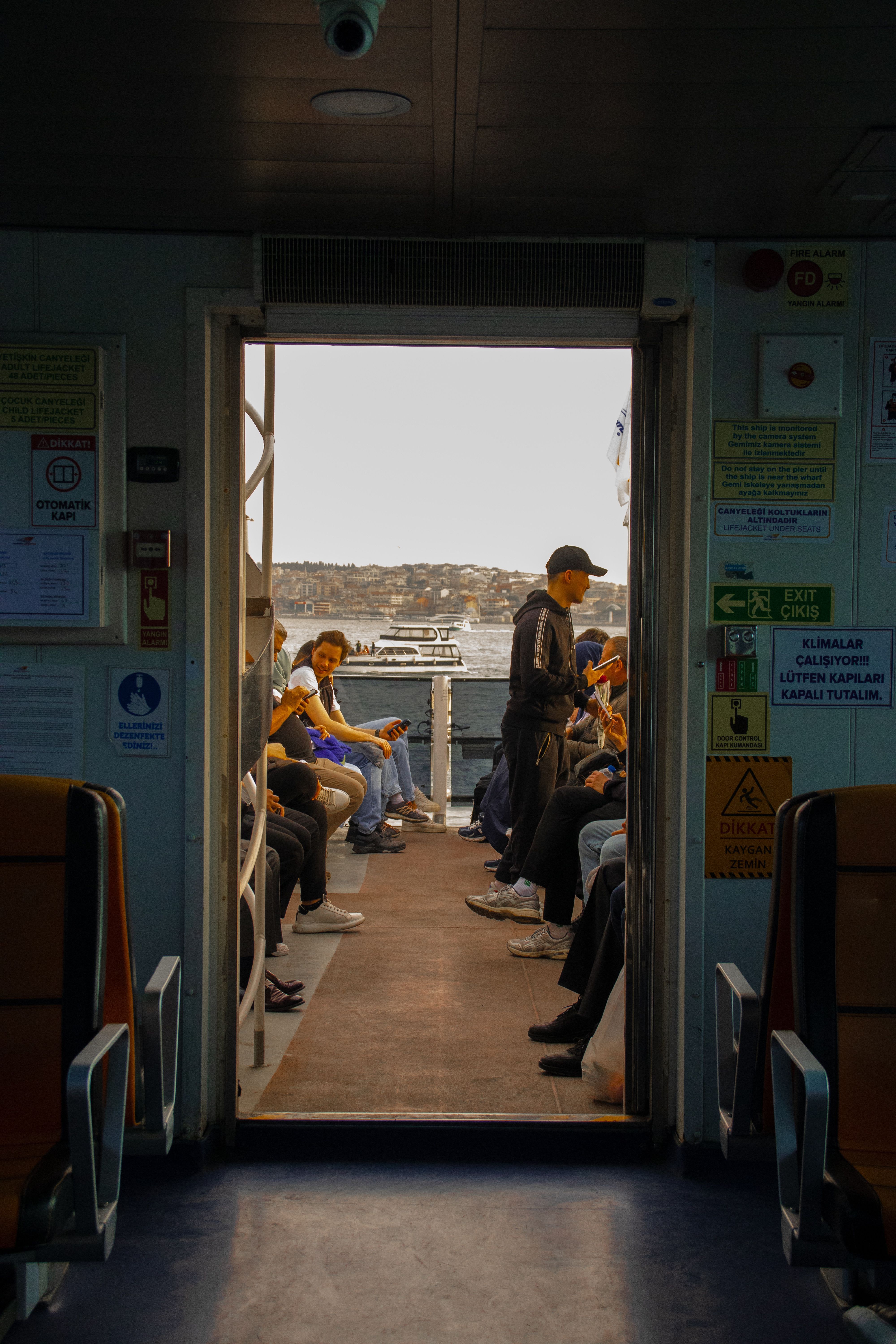 Scenic Ferry Ride with Passengers Onboard · Free Stock Photo