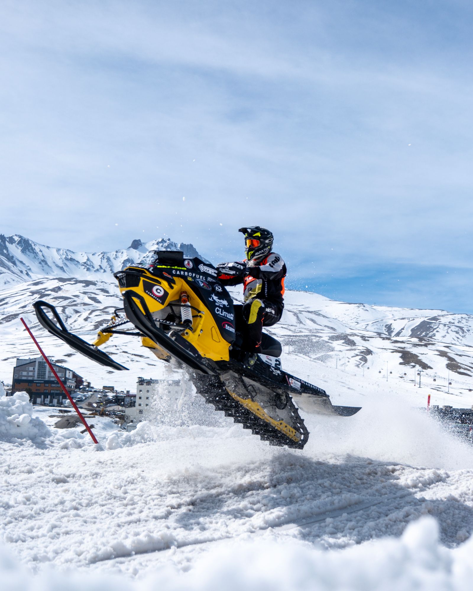 Person Riding Blue Snow Mobile · Free Stock Photo