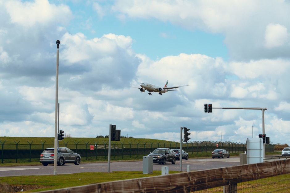 Signage indicating a drop-off zone at a UK airport