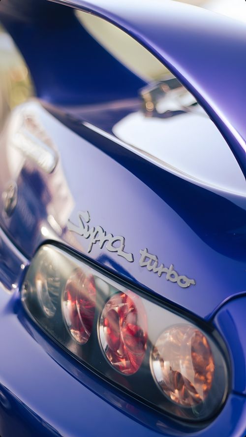 Free Stunning close-up of a blue Toyota Supra Turbo car's tail lights in Dubai. Stock Photo
