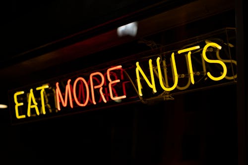 Makan Lebih Banyak Kacang Neon Signage