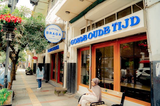 A cozy coffee shop facade on Braga Street, Bandung, invites tourists with its charming ambiance.