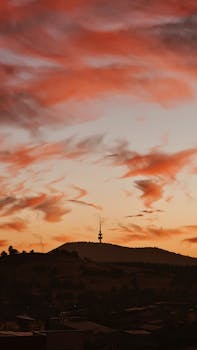 Stunning sunrise with vibrant colors over Black Mountain, Canberra.