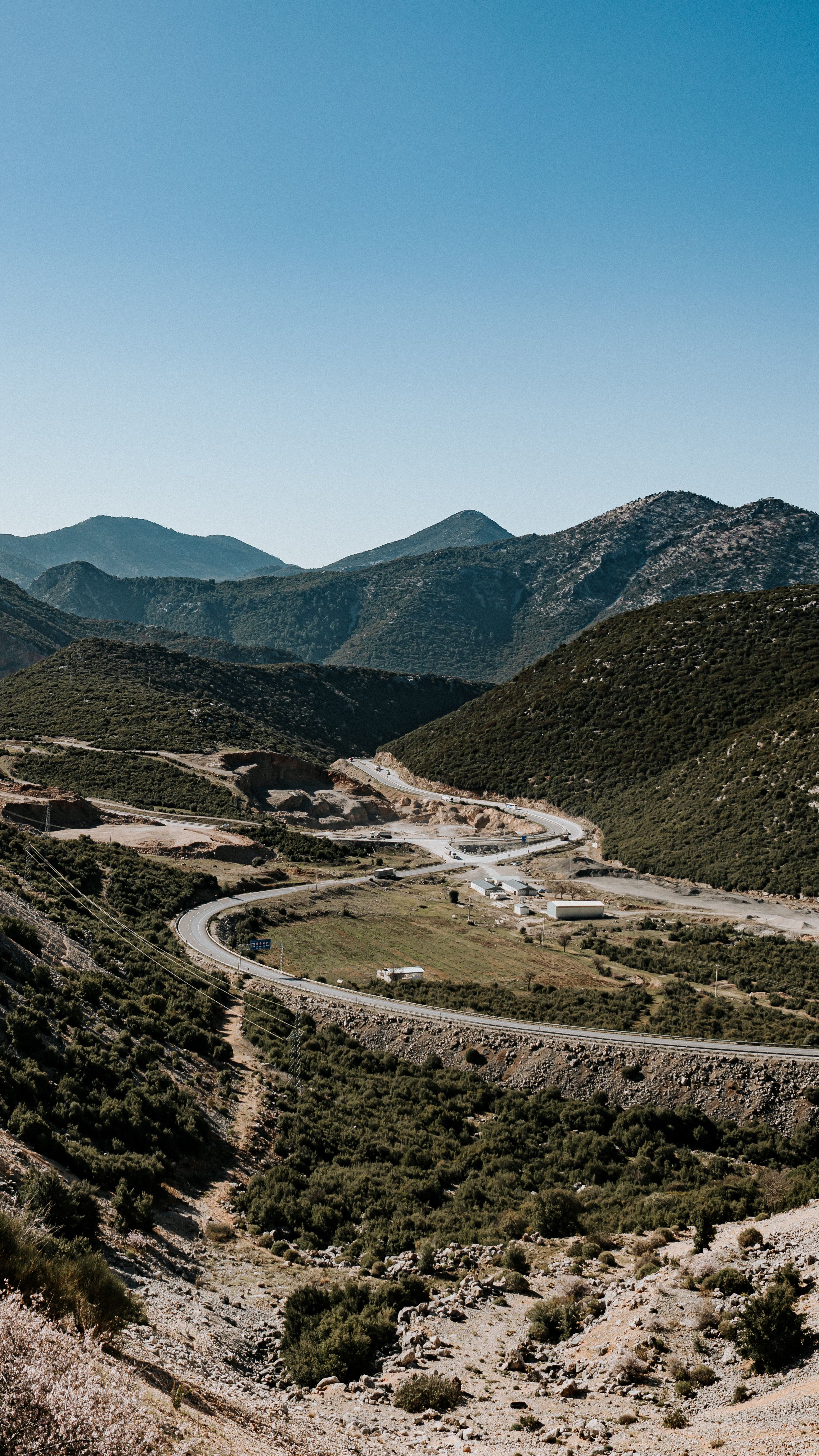 Scenic Mountain Road with Lush Greenery · Free Stock Photo