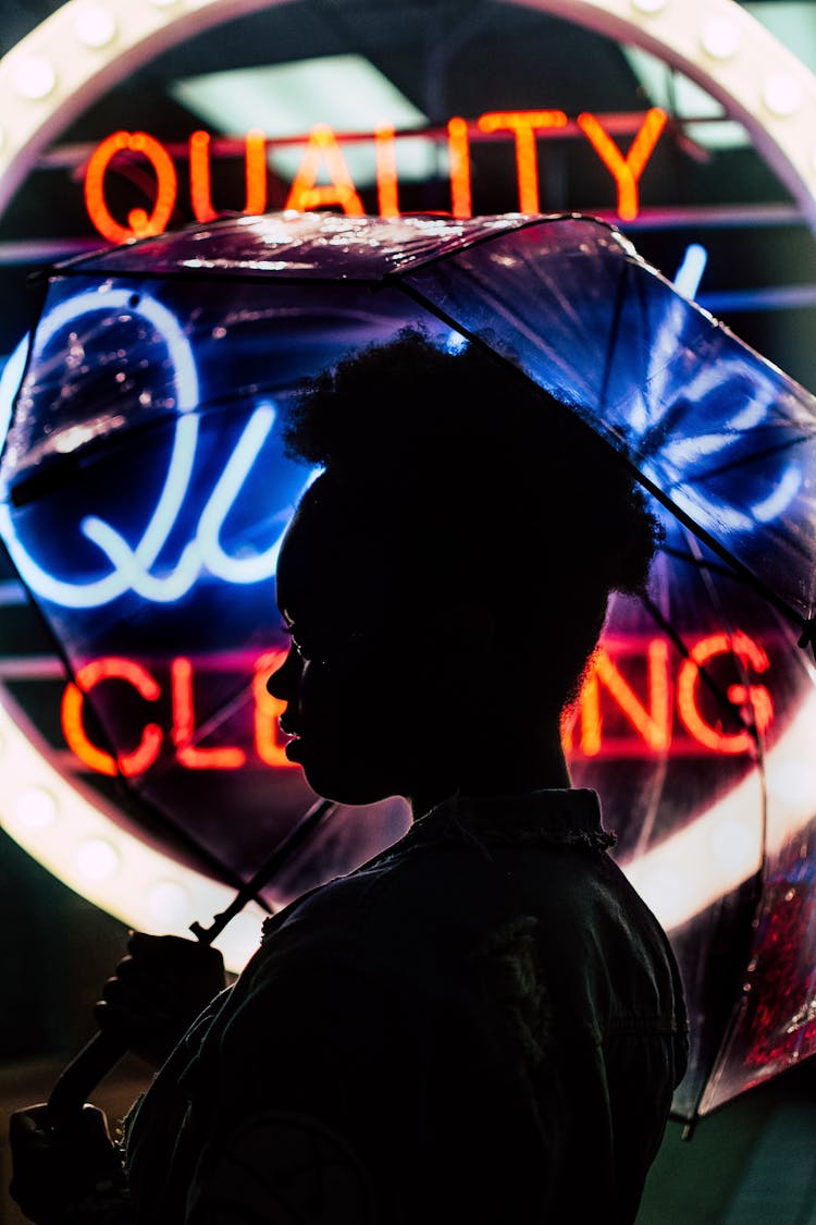 Silhouette Photography Of Person Holding An Umbrella