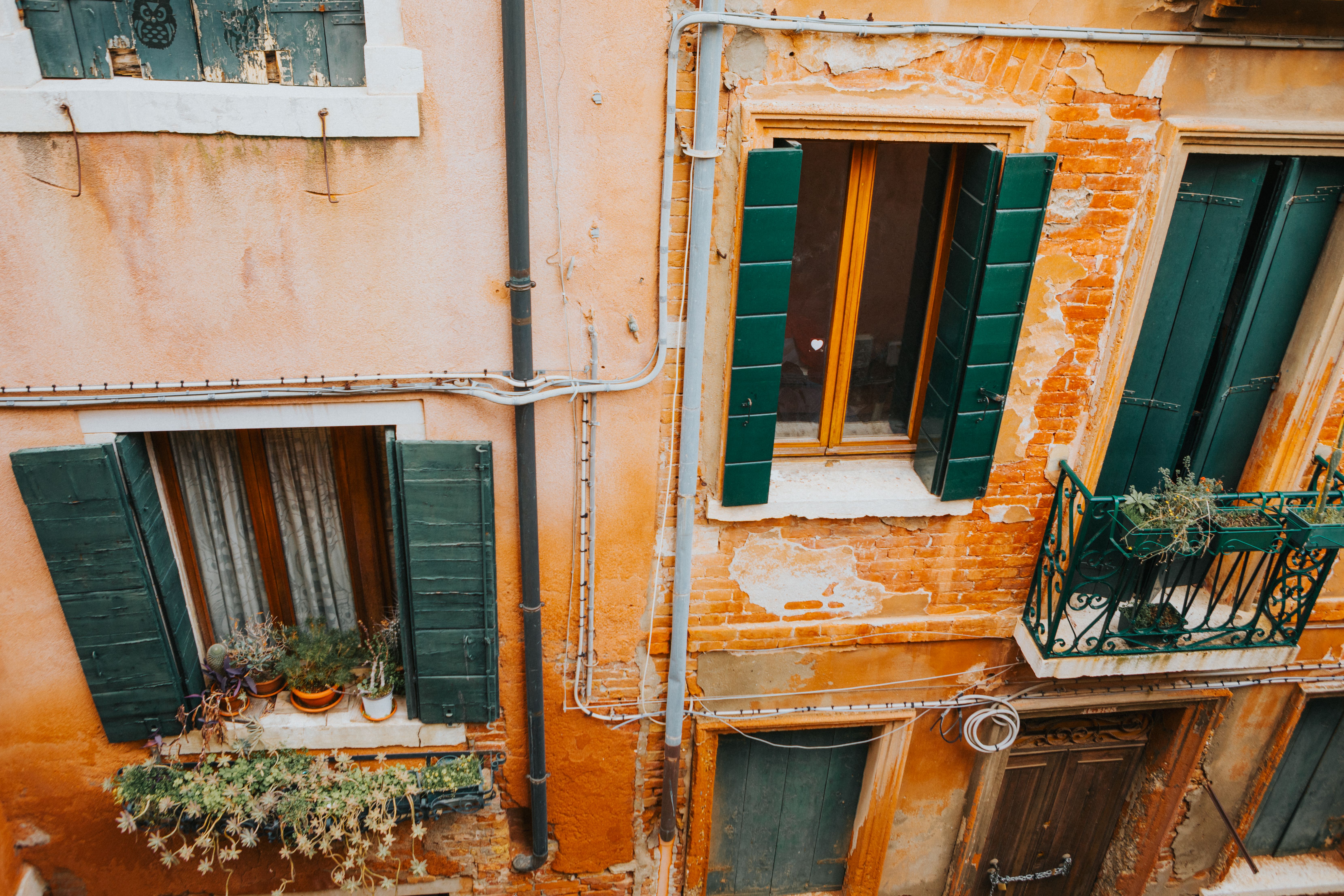 Rustic Italian Building with Green Shutters · Free Stock Photo