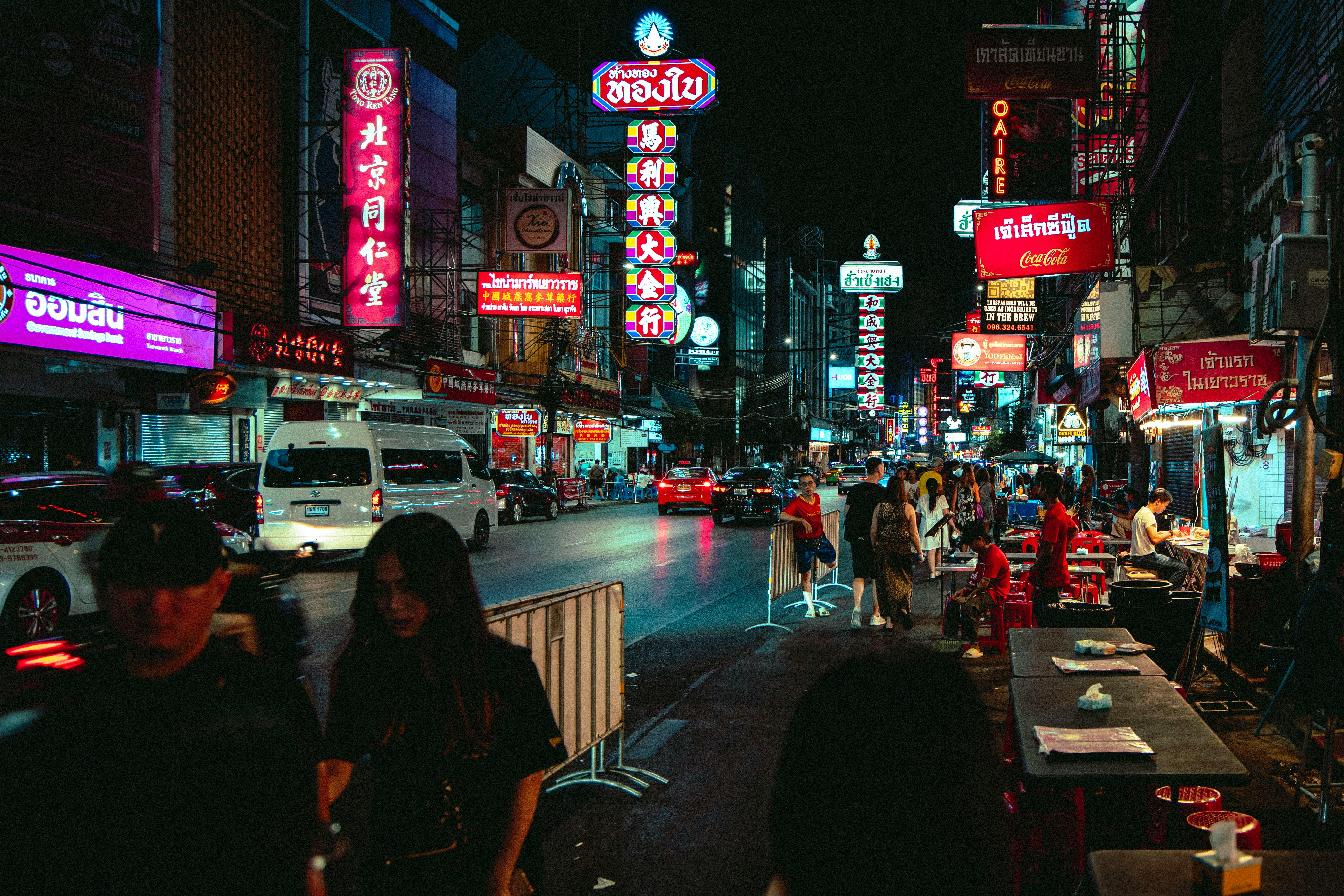 Explore the bustling nightlife of Bangkok's Chinatown packed with neon lights and street vendors.