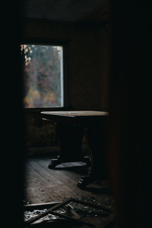 Free Brown Wooden Table Near Window Stock Photo