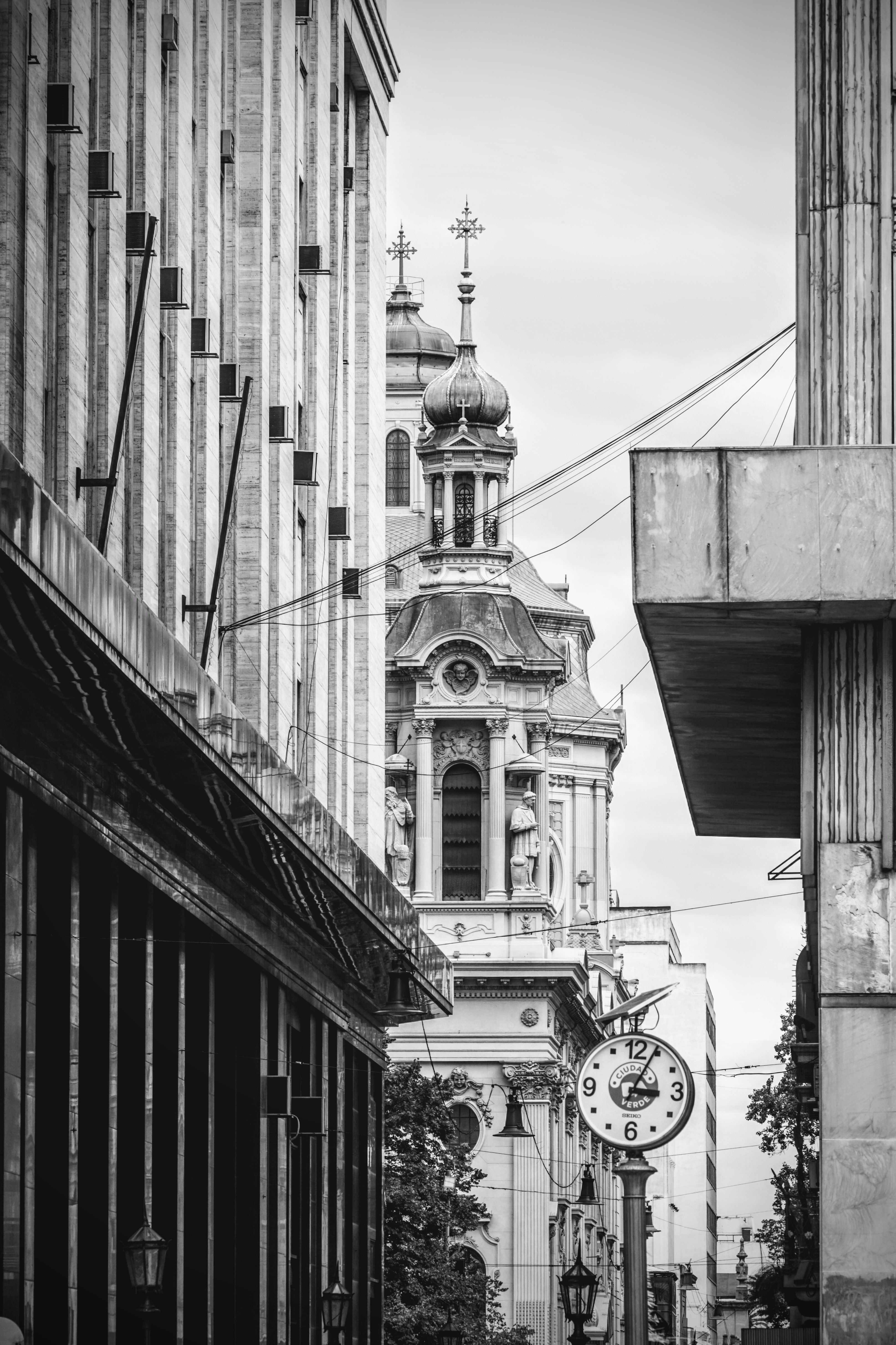 Historic European Street View Featuring Clock Tower · Free Stock Photo