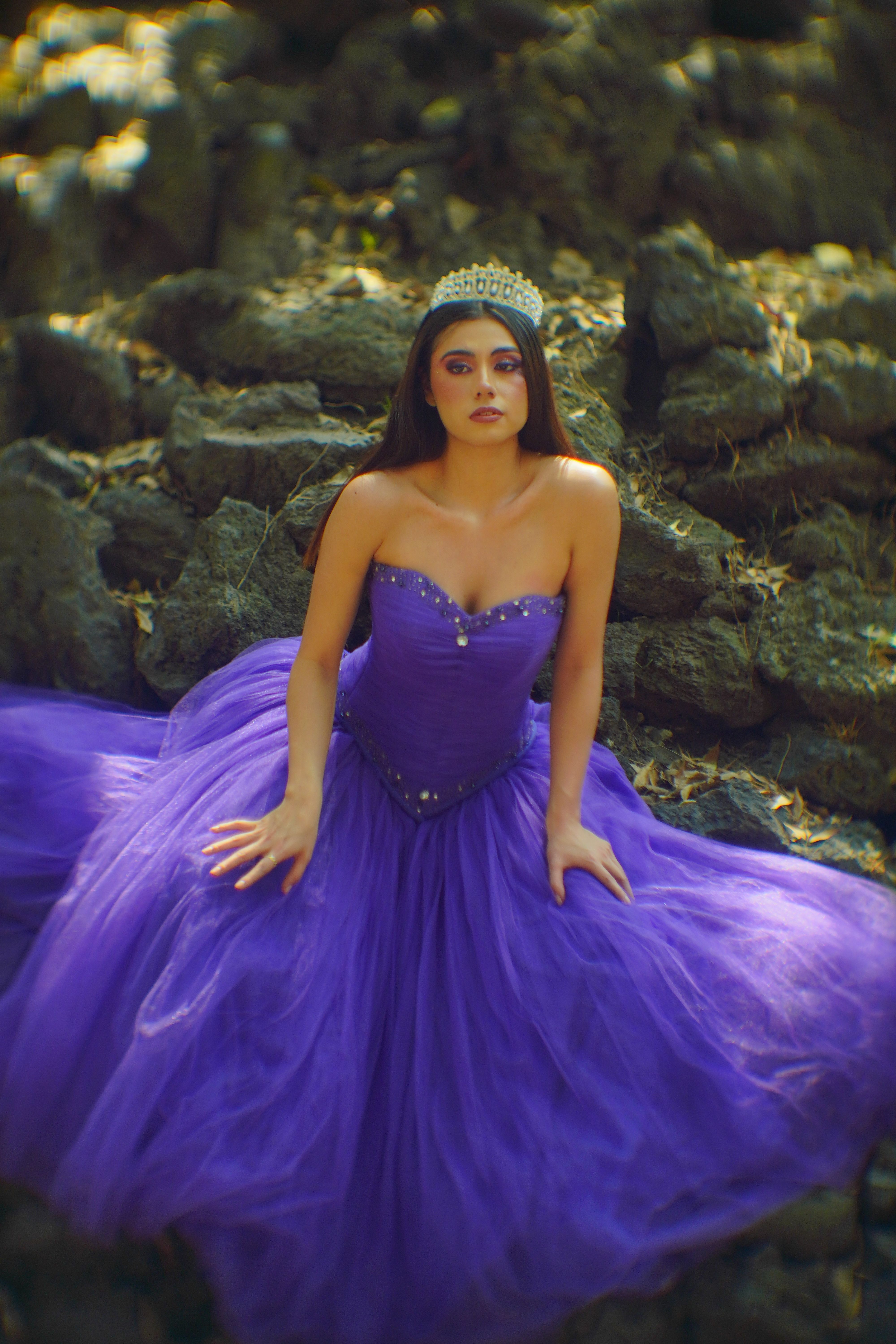 Elegant Woman in a Royal Purple Gown Outdoors · Free Stock Photo