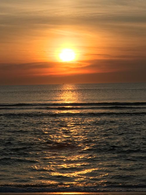 Free Captivating sunrise over the ocean at Highlands, NJ, showcasing serene beauty and vibrant colors. Stock Photo