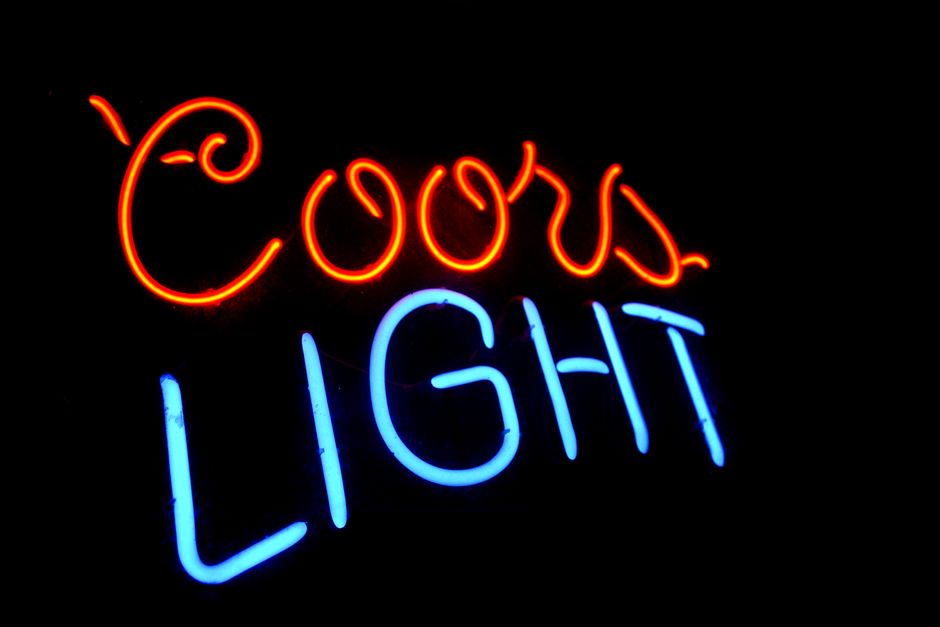 Subject illuminated by colorful neon lights - low light photography without flash Subject illuminated by colorful neon lights - low light photography without flash