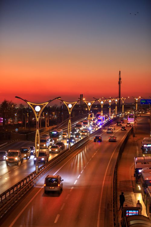 Free Bustling traffic on D100 highway at sunset in İzmit, Türkiye, with vibrant sky. Stock Photo