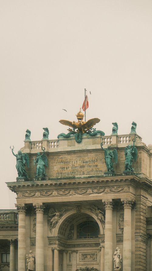 Free Ornate architectural detail from a famous landmark in Paris, showcasing classical statues. Stock Photo