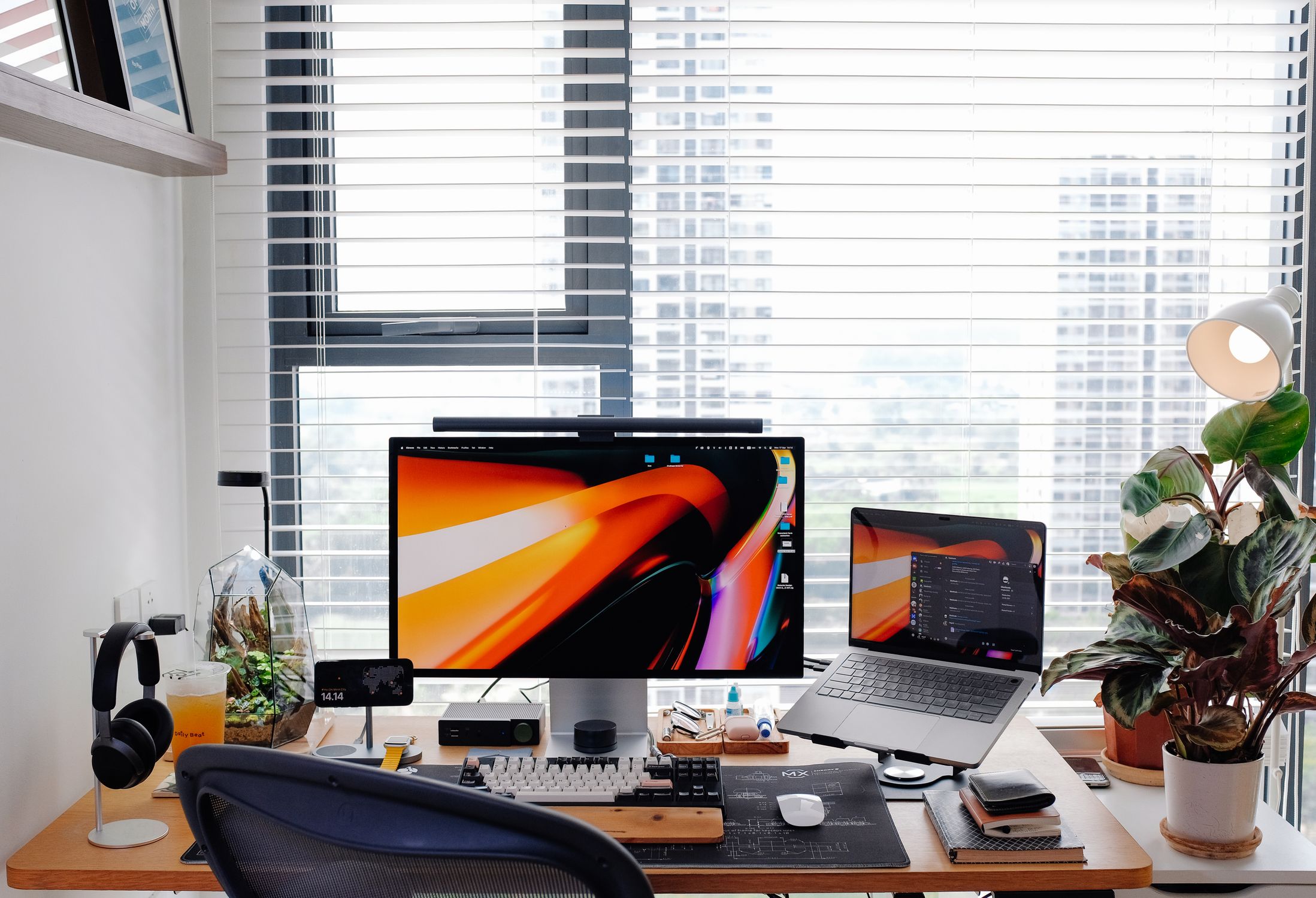 Modern Workspace with Laptop and Monitor Setup · Free Stock Photo
