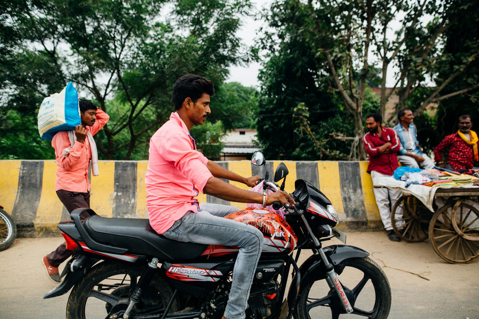 Man Riding on Motorcycle