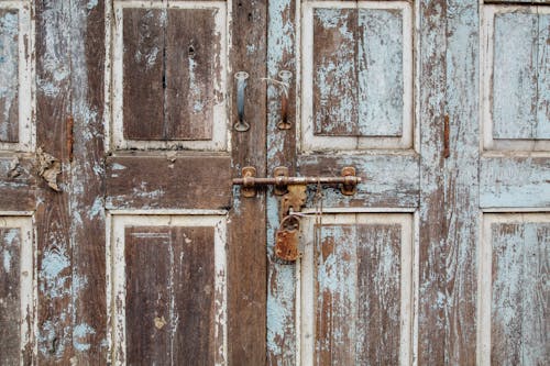 Old Wooden Door With Rusty Padlock