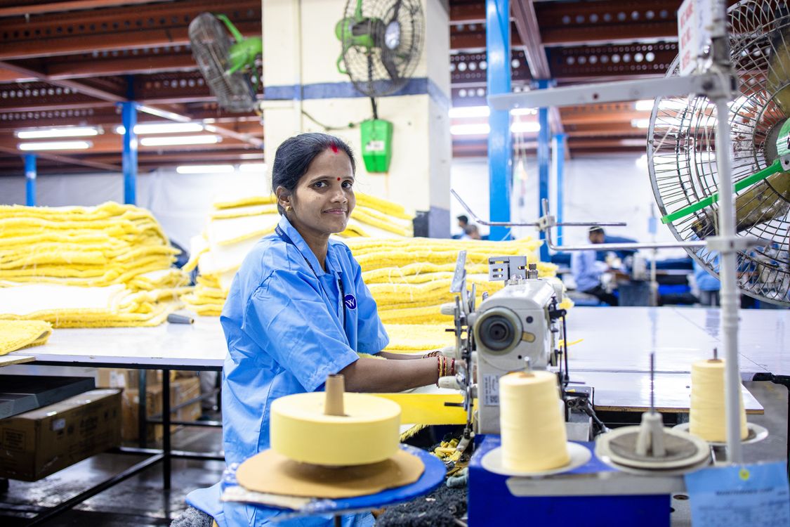 Female Textile Worker at Sewing Machine in Factory · Free Stock Photo