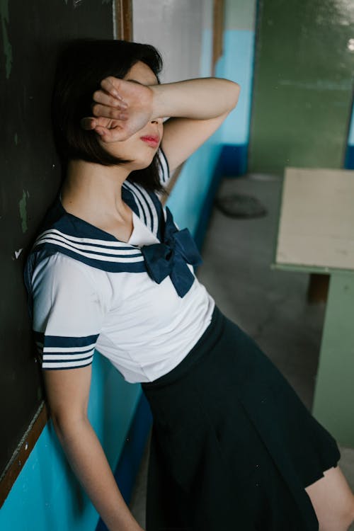 Photo Of Woman Leaning On Blackboard