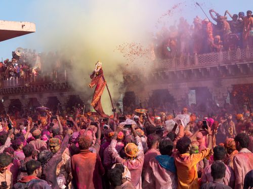 Free A lively Holi festival scene in Nandgaon, India, showcasing vivid colors and cultural traditions. Stock Photo