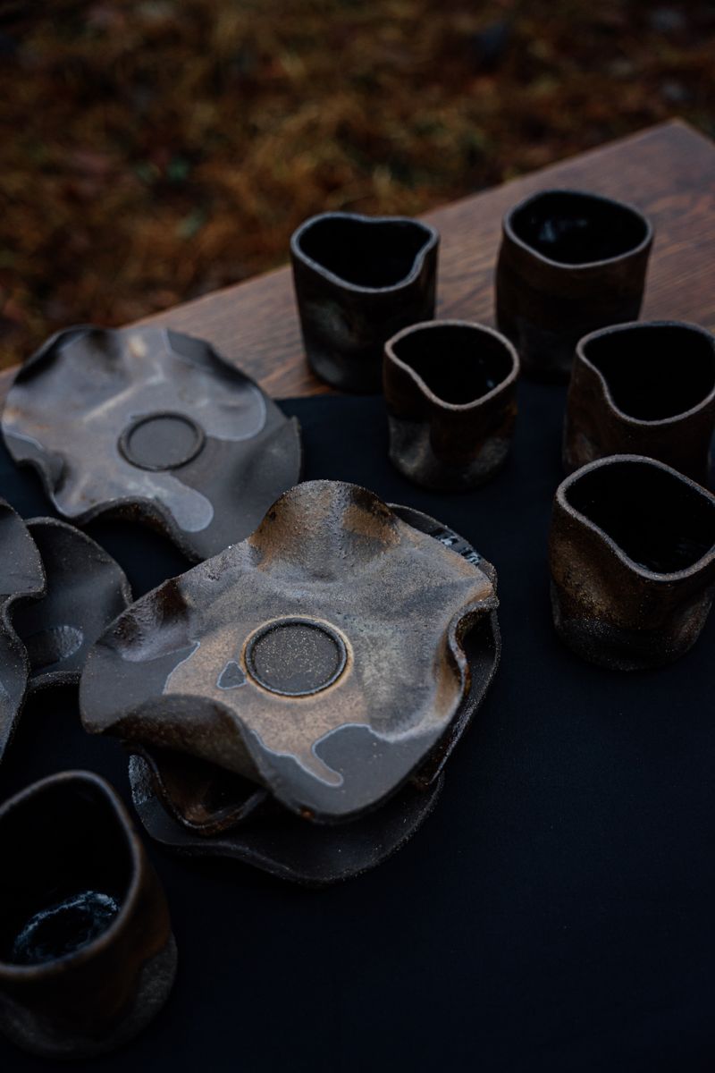 Artisan ceramics with organic forms in earthy tones