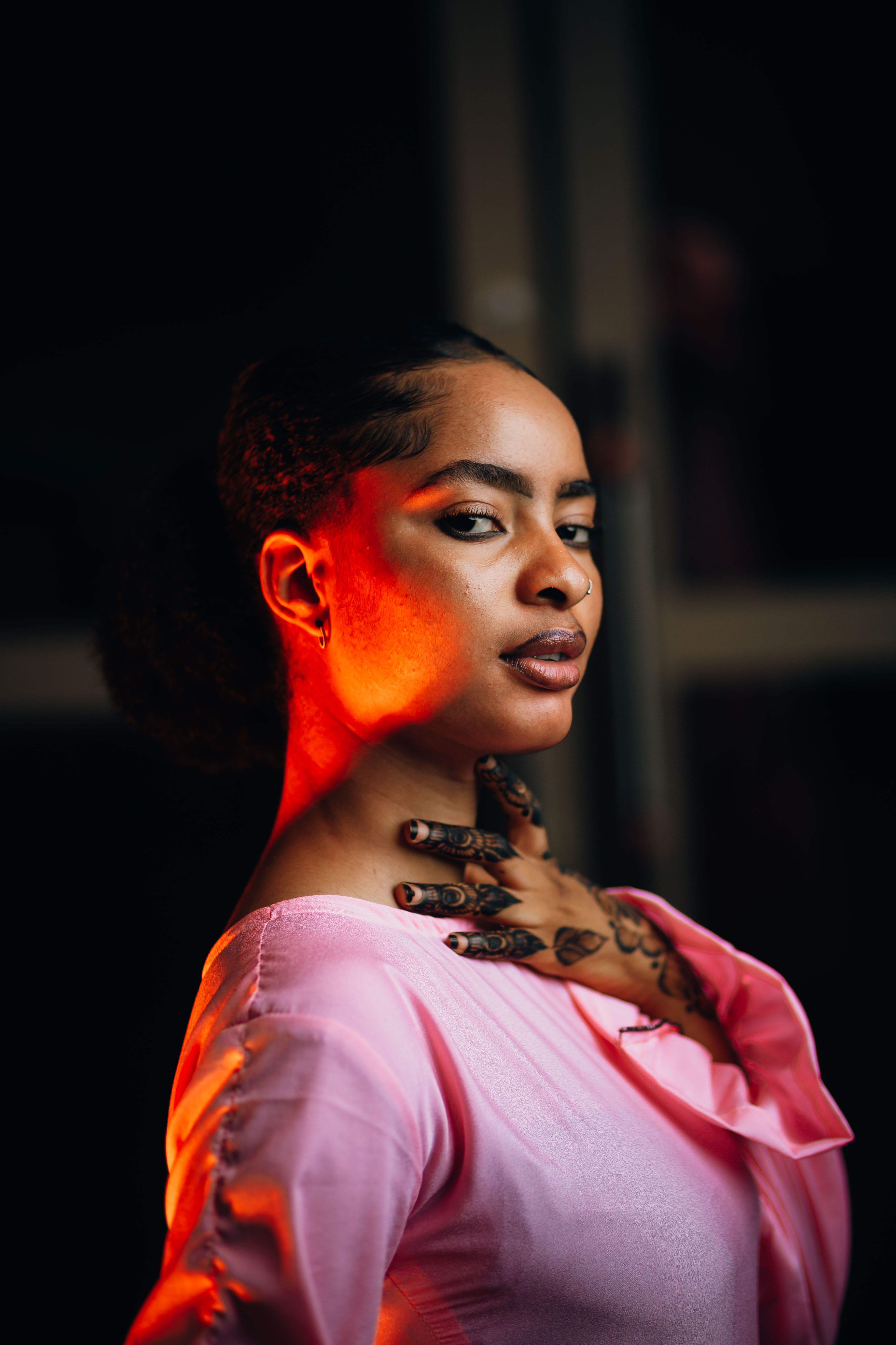 Elegant Portrait of Woman with Red Lighting · Free Stock Photo