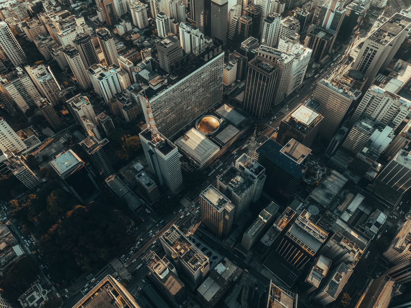 Stunning aerial view of skyscrapers and bustling streets in São Paulo city.