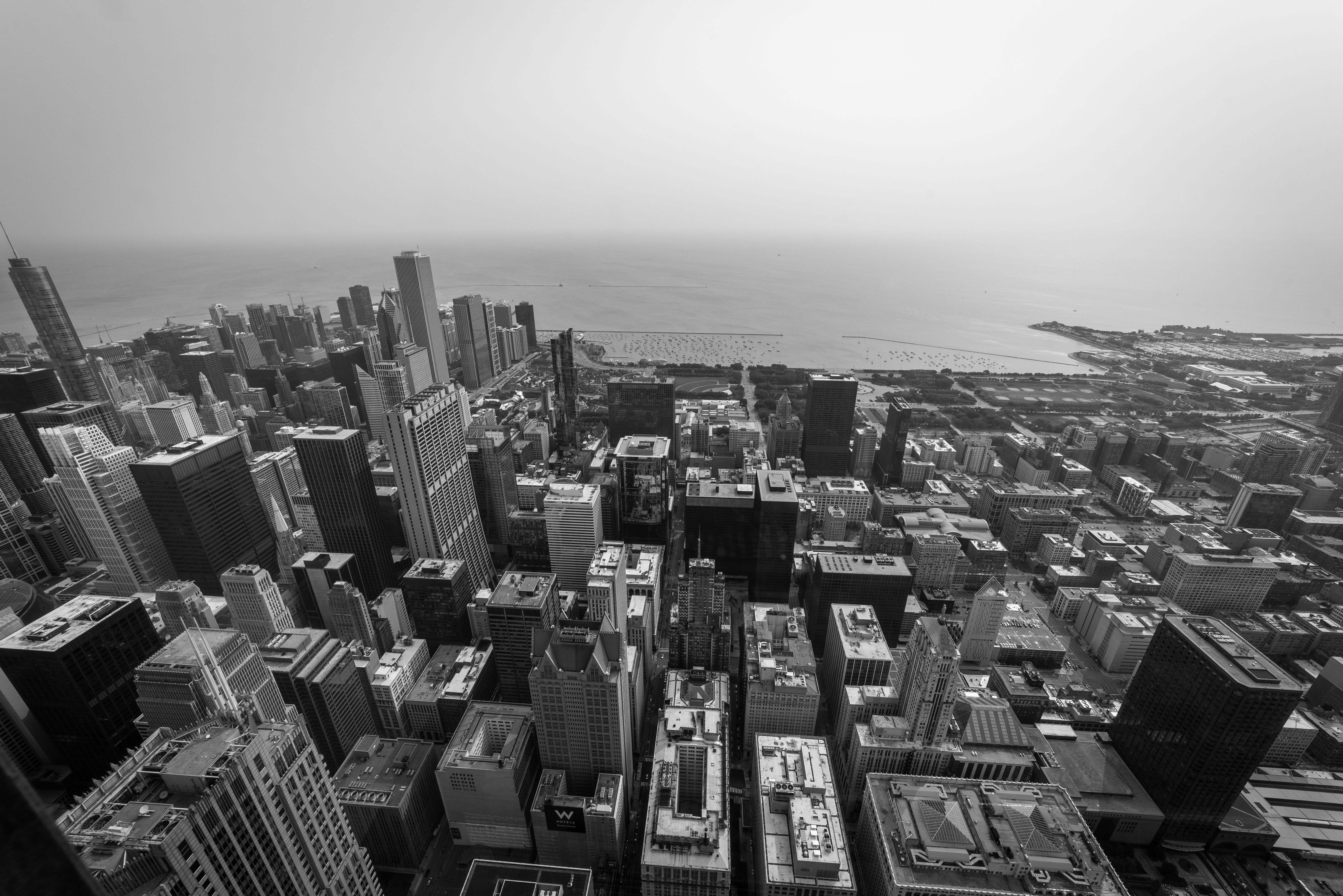 Incredible Mackinac Bridge Helicopter Tour Review: Soaring Over Michigan's Most Iconic Landmark Review 2026 - Stunning black and white aerial view of Chicago skyscrapers and Lake Michigan.