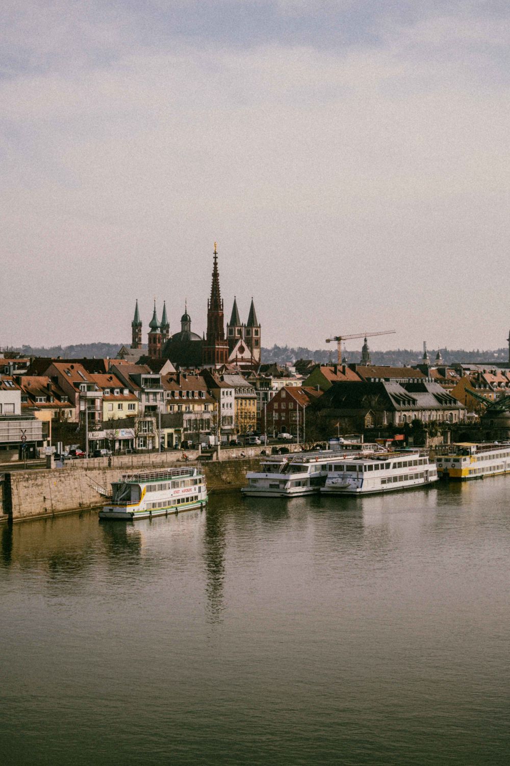 Scenic Riverside View of Historic European City · Free Stock Photo