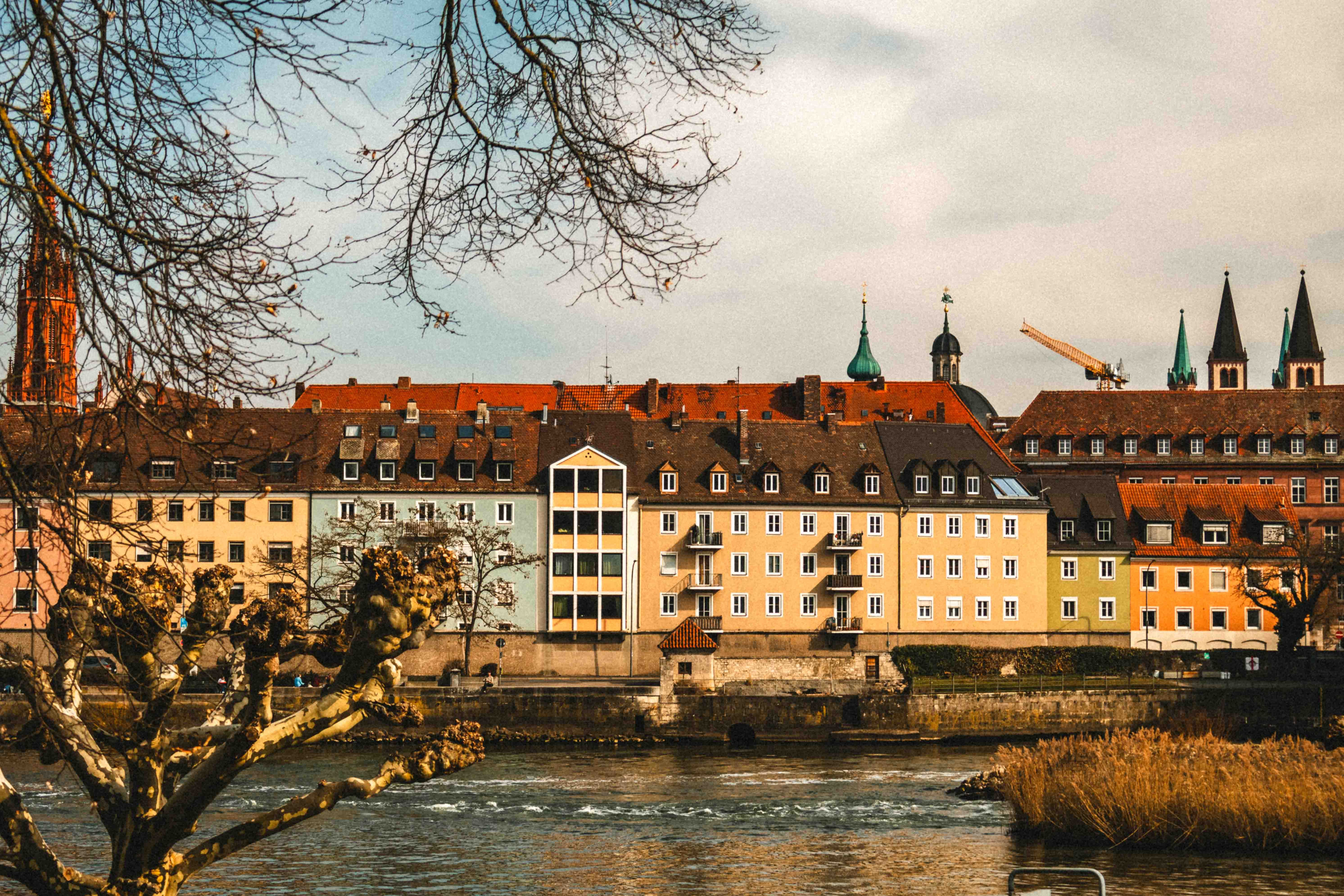 Picturesque German Riverside Townscape in Autumn · Free Stock Photo