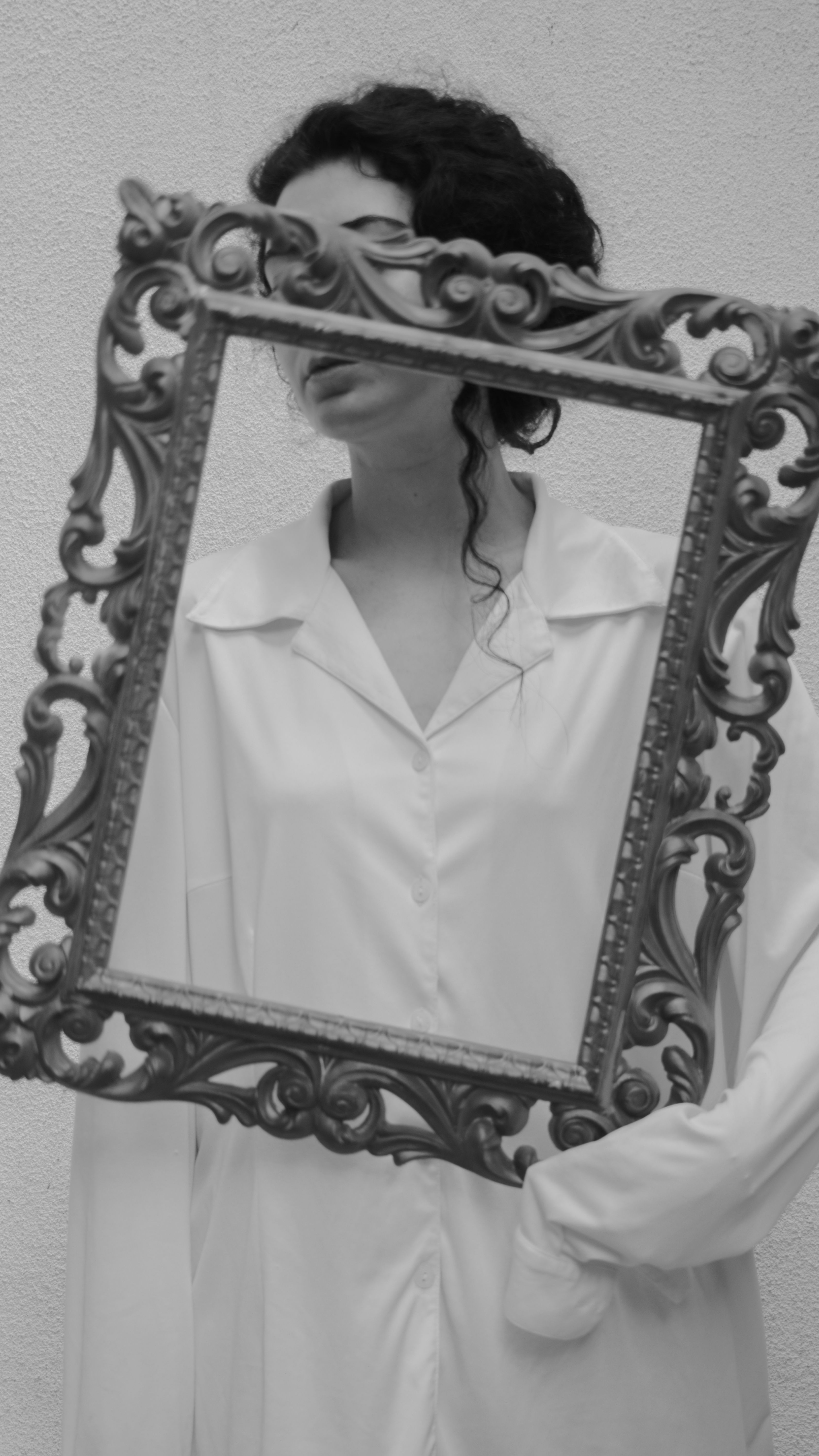 Creative Monochrome Portrait with Ornate Frame · Free Stock Photo