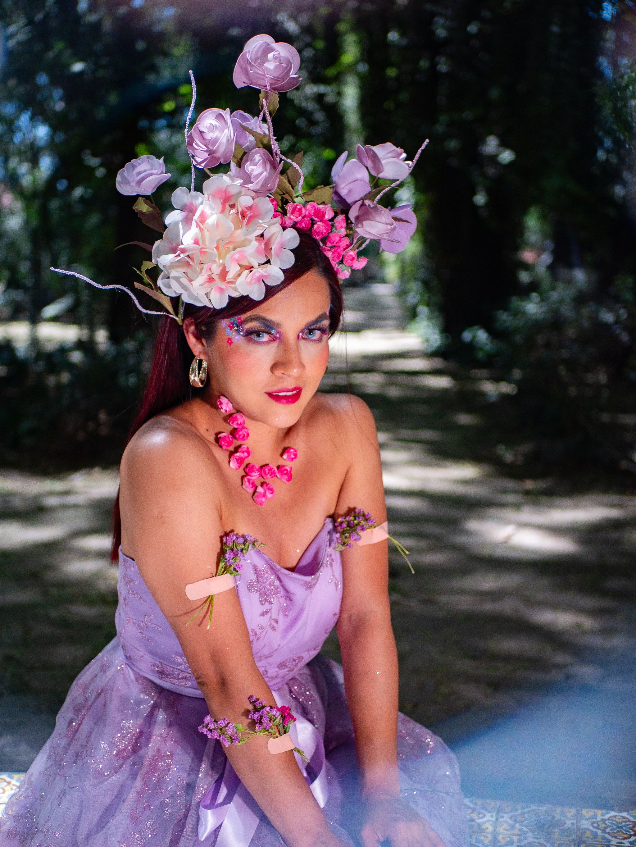 Elegant Woman in Floral Headpiece in Park · Free Stock Photo