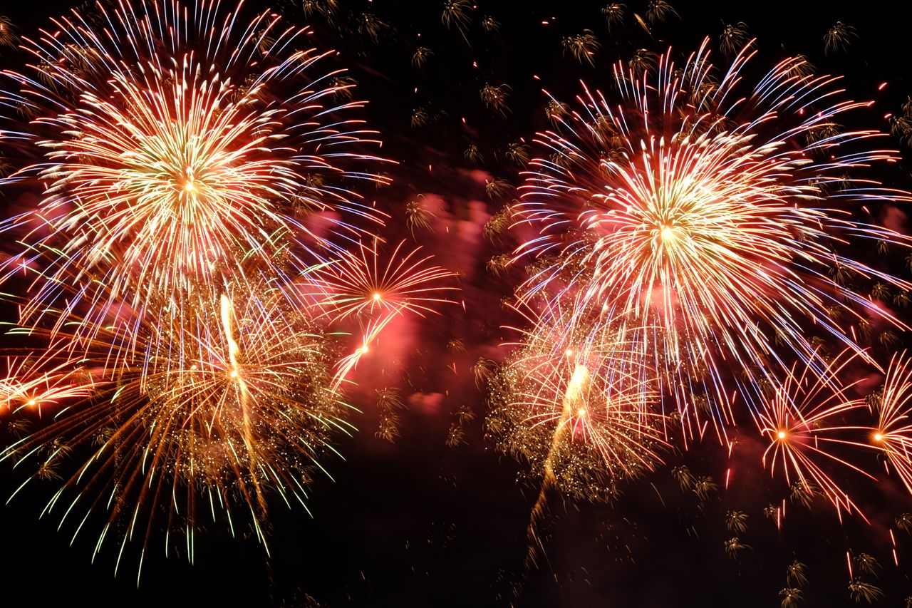 bright fireworks bursting in a colorful night sky celebration