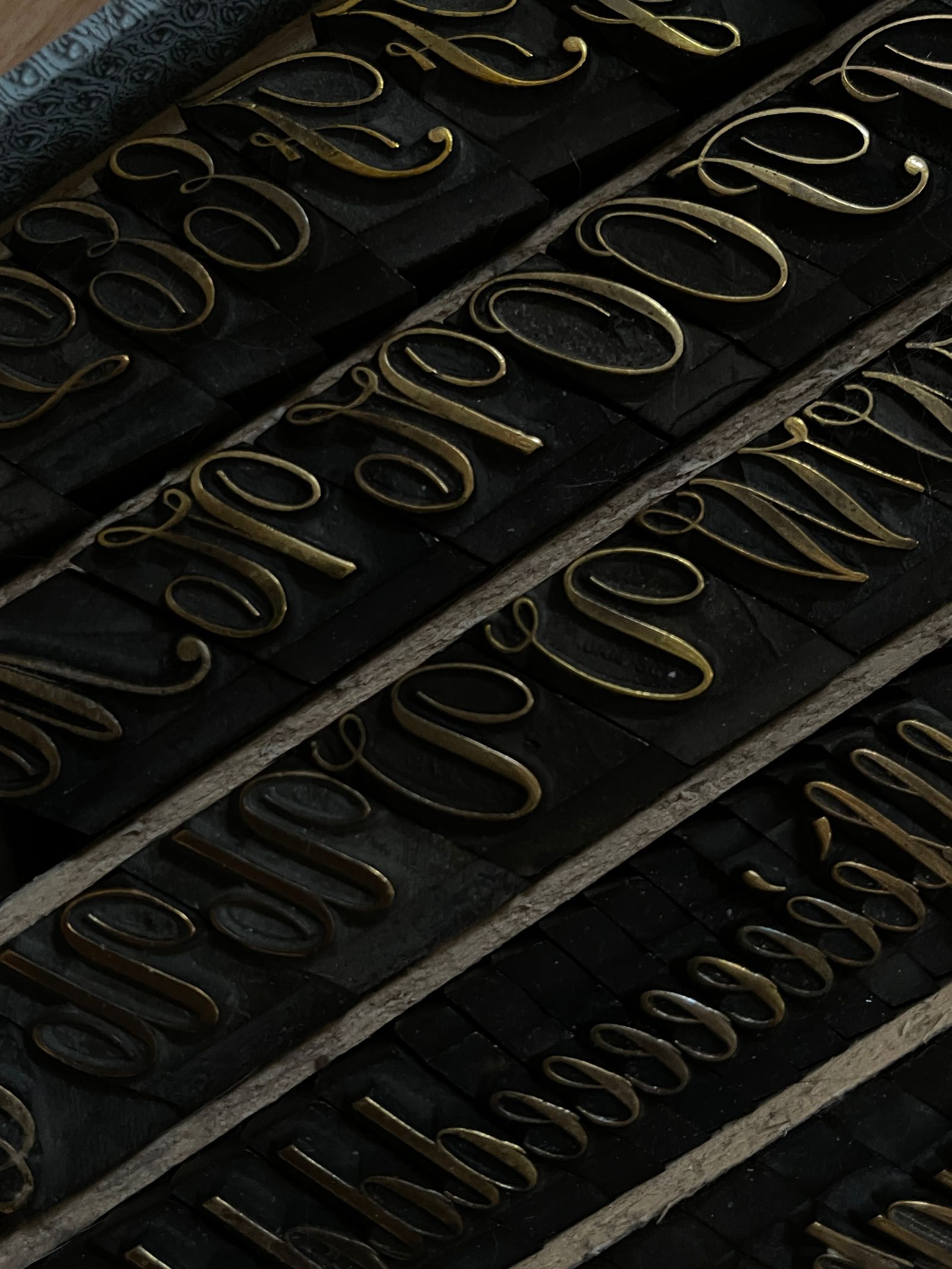 Vintage metal type letters used in traditional printing