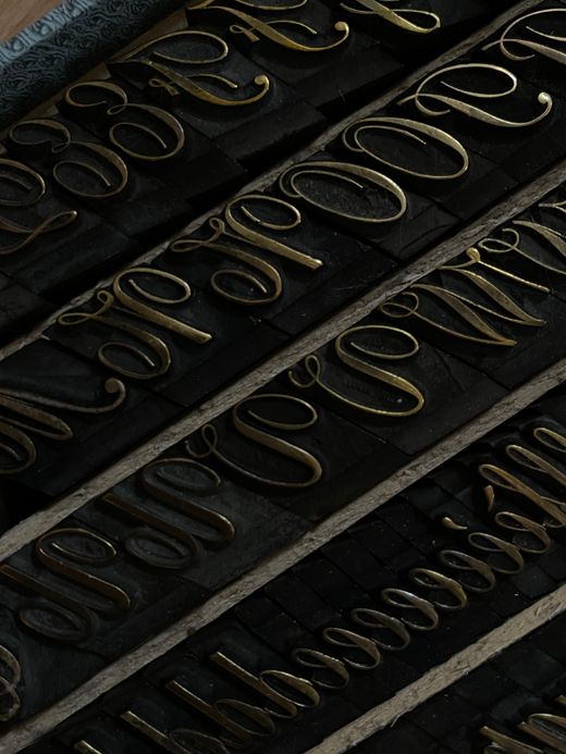 Vintage metal type letters, photo by Eugenia Remark on Pexels